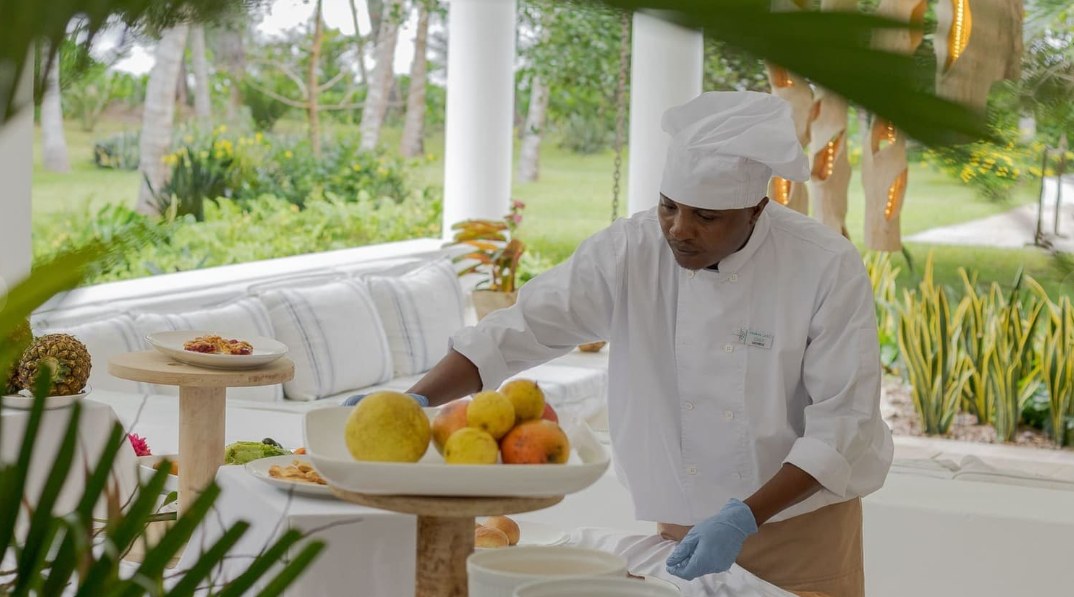 Zuri chef preparing a fresh fruit spread